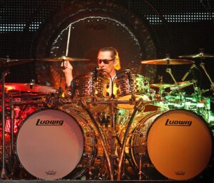 Alex Van Halen playing his Ludwig drum kit at a Van Halen concert