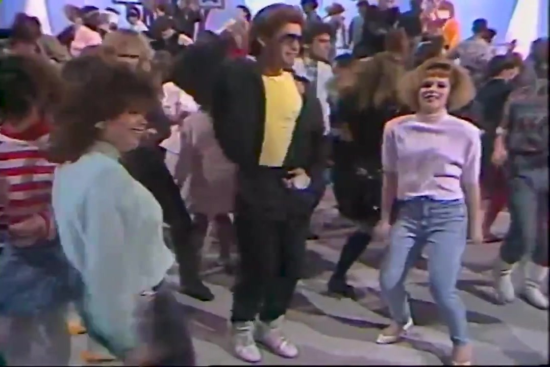 Teen dancers fill the Dance Party USA studio floor, from a late-80s promo tape