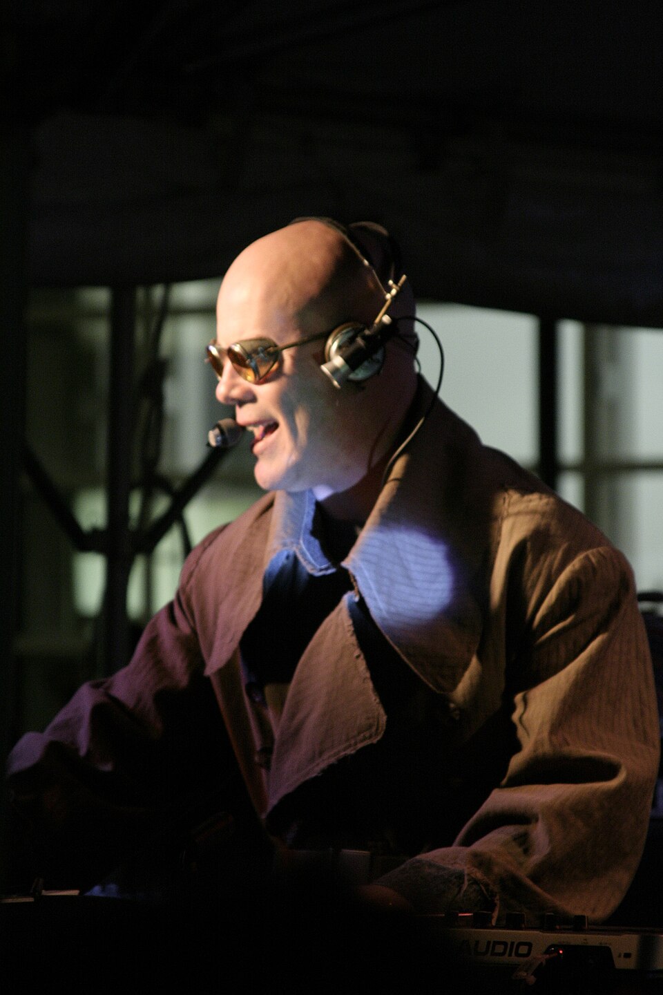 Thomas Dolby in his signature goggles and headset at a live performance