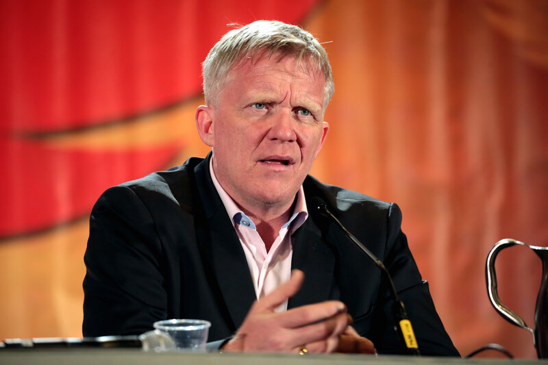 Anthony Michael Hall speaking at a panel at Phoenix Comicon in 2017