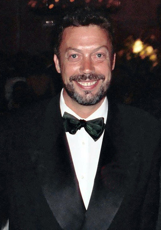 Tim Curry in a tuxedo at the 47th Emmy Awards Governor Ball in 1995