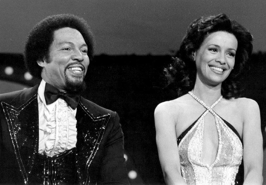 Marilyn McCoo, who hosted Solid Gold for most of its run, with Billy Davis Jr. in a 1977 CBS publicity photo